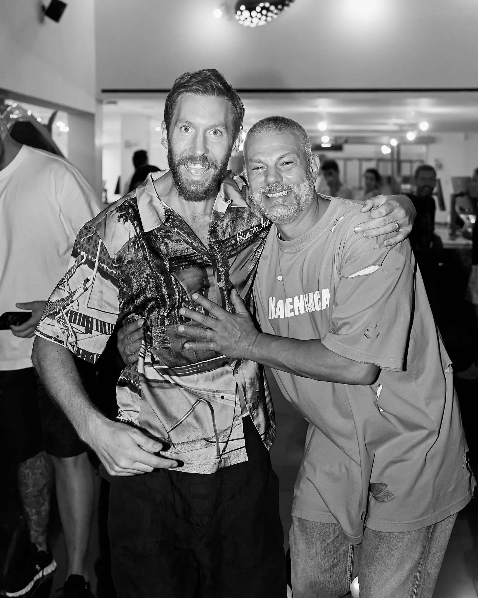 Yann Pissenem hugs Calvin Harris backstage at Ushuaïa Ibiza in 2025