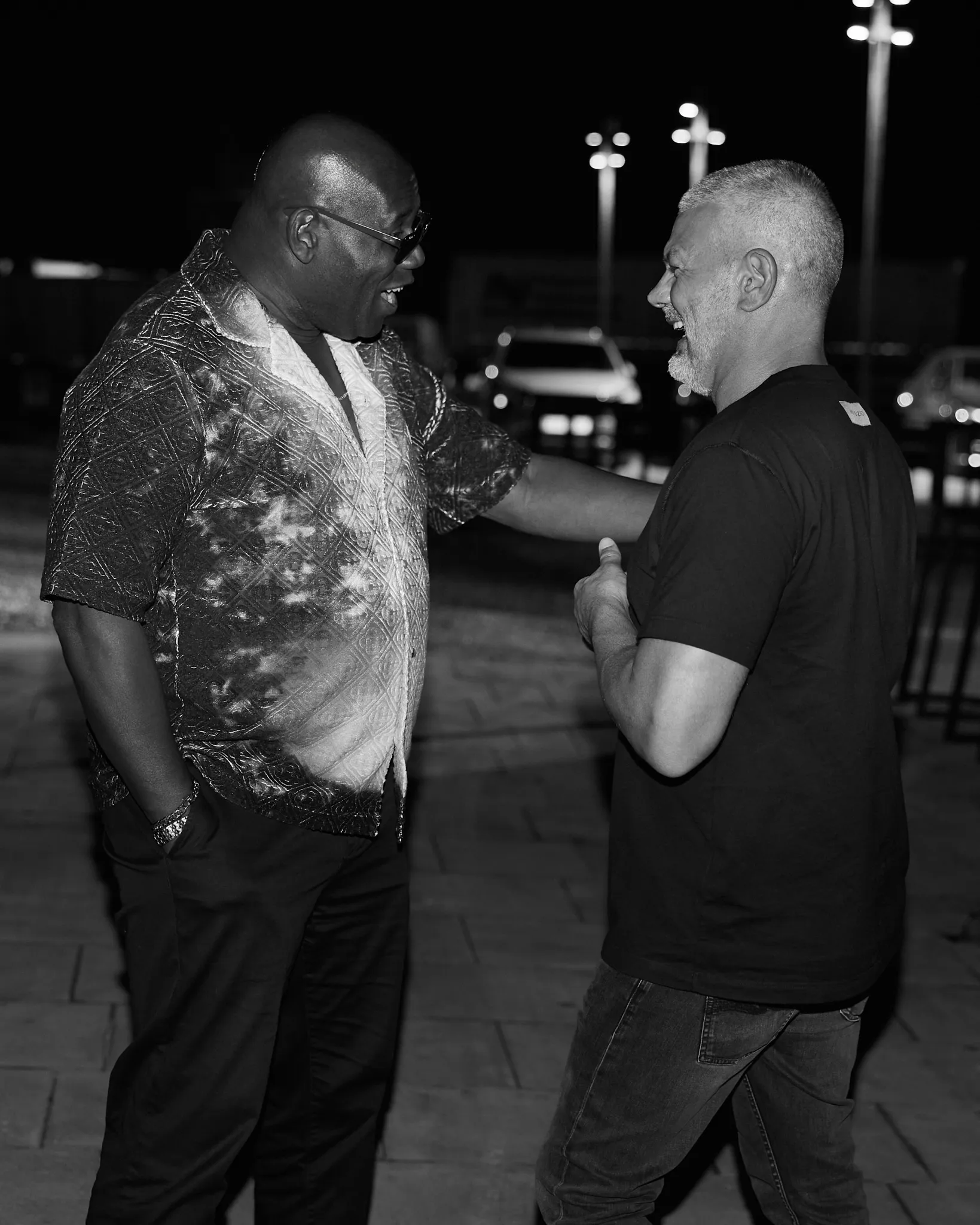 Yann Pissenem talks with Carl Cox outside [UNVRS] in Ibiza, 2025