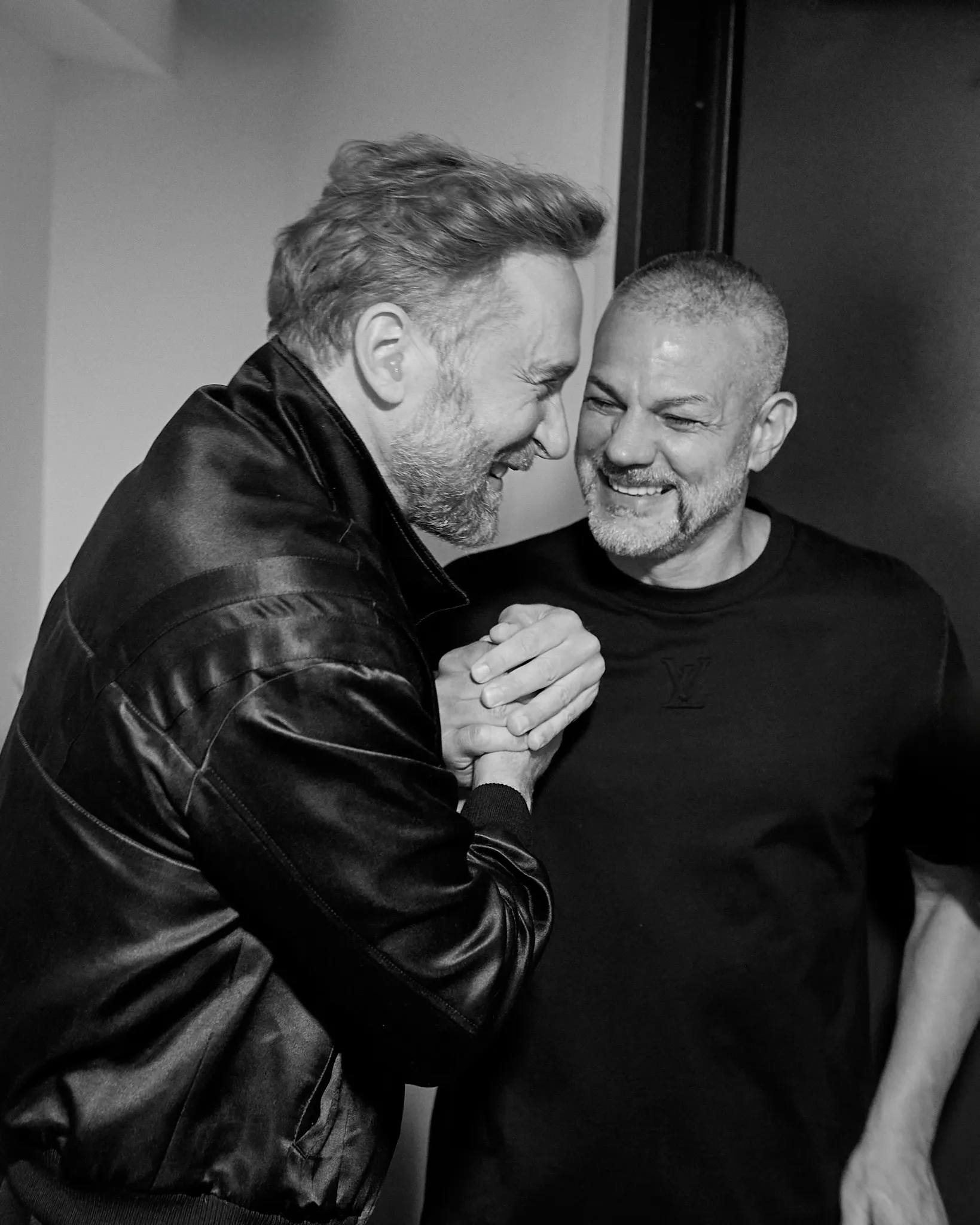 Yann Pissenem hugs David Guetta backstage at [UNVRS] in Ibiza, 2025
