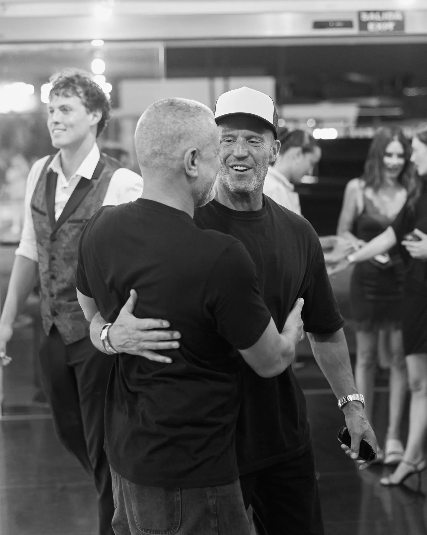 Yann Pissenem hugs Jason Statham backstage at [UNVRS] in Ibiza, 2025