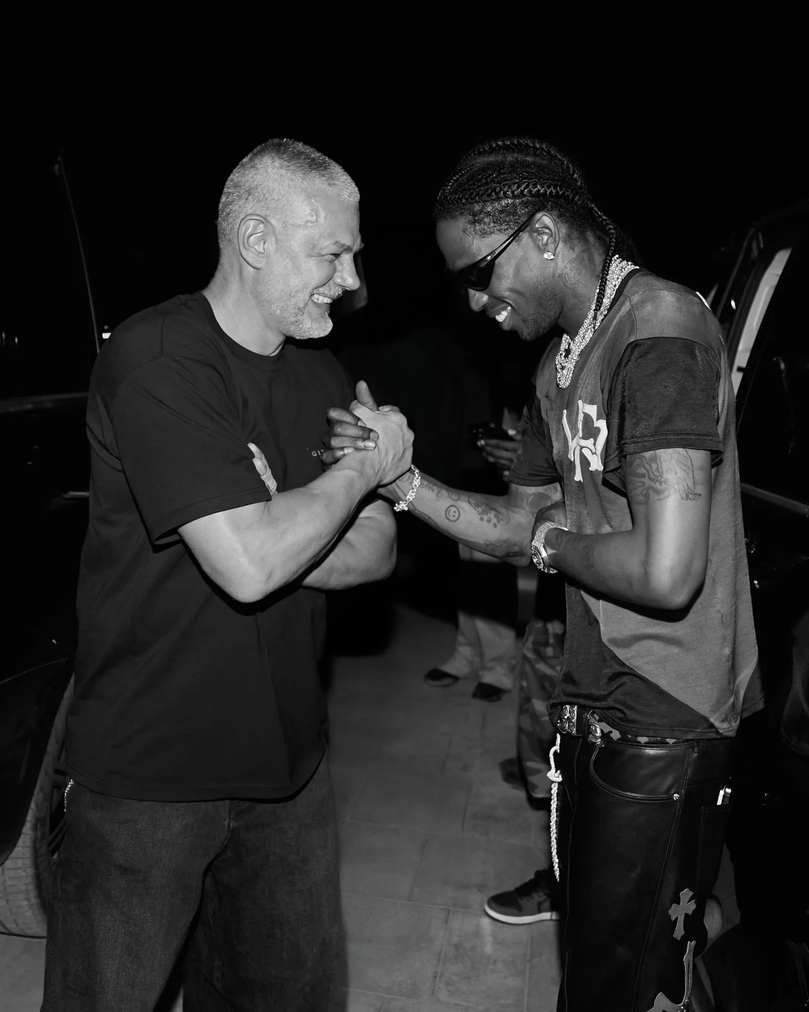 Yann Pissenem with Travis Scott outside [UNVRS] in Ibiza, 2025